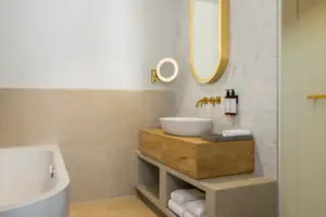 Bathroom with a bath Bathroom with a washbasin and a bath