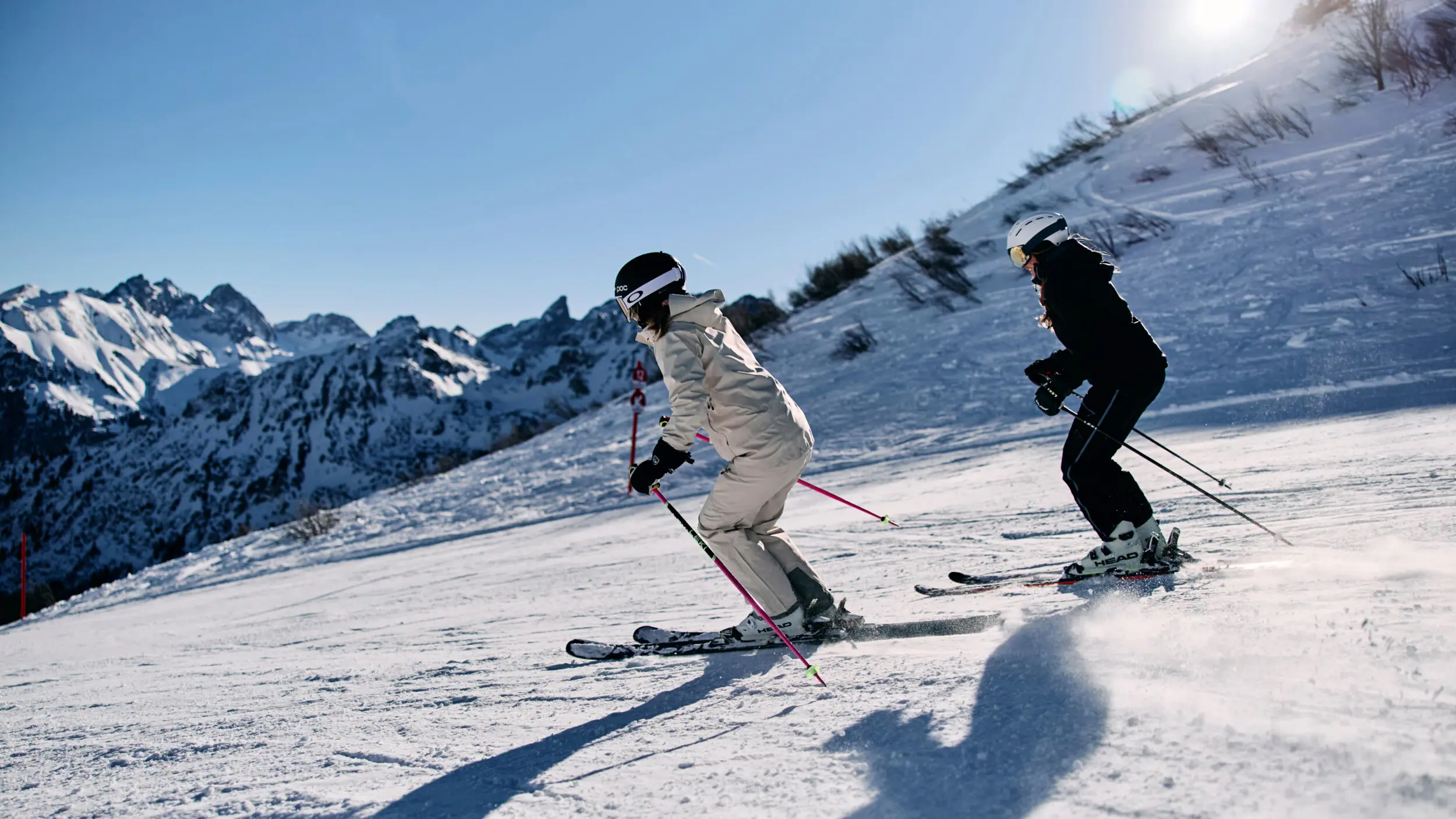 A group of people skiing on a snowy slope.