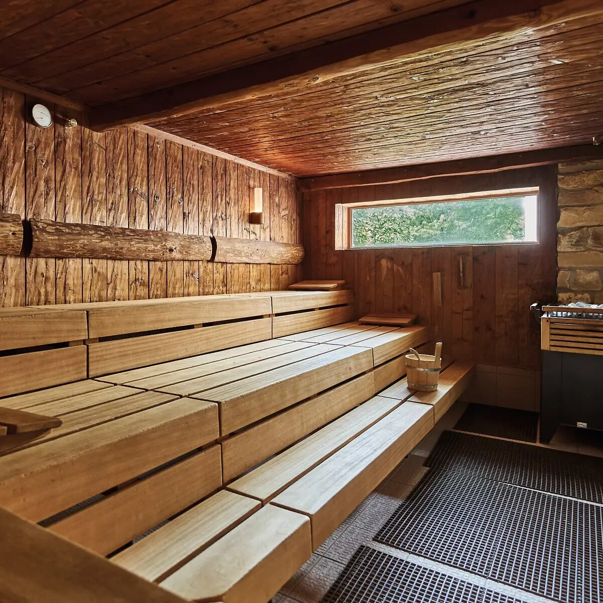 Sauna Wooden bench in a sauna with hardwood walls.