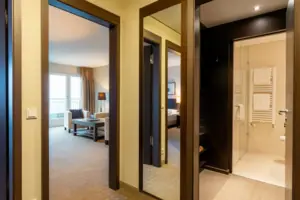 A room with a large mirror.