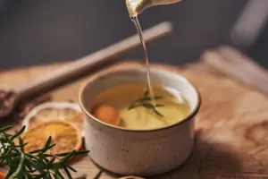 A liquid is poured into a bowl.