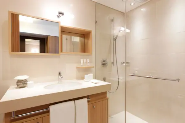Bathroom with glass shower and washbasin