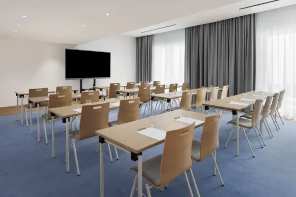 Conference Room 3 at the A-ROSA Tegernsee, with a parliamentary seating arrangement.