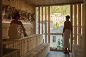 A man and a woman in a sauna.