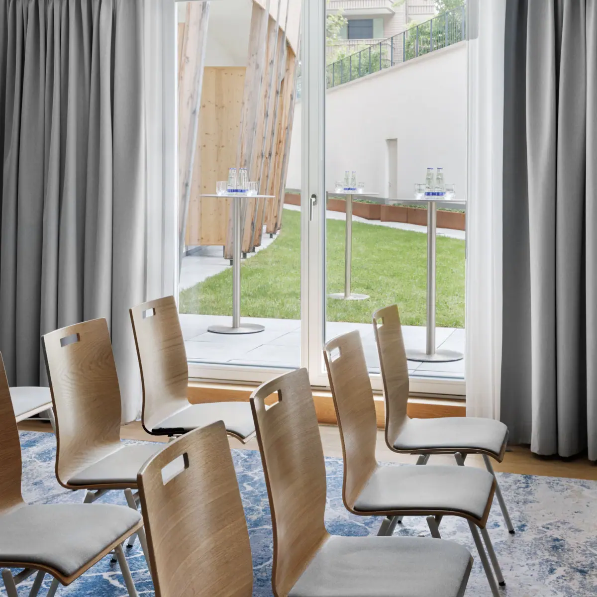 A meeting room at A-ROSA Tegernsee with a terrace.