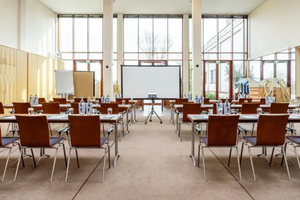 Conference Loft A room with desks and chairs.