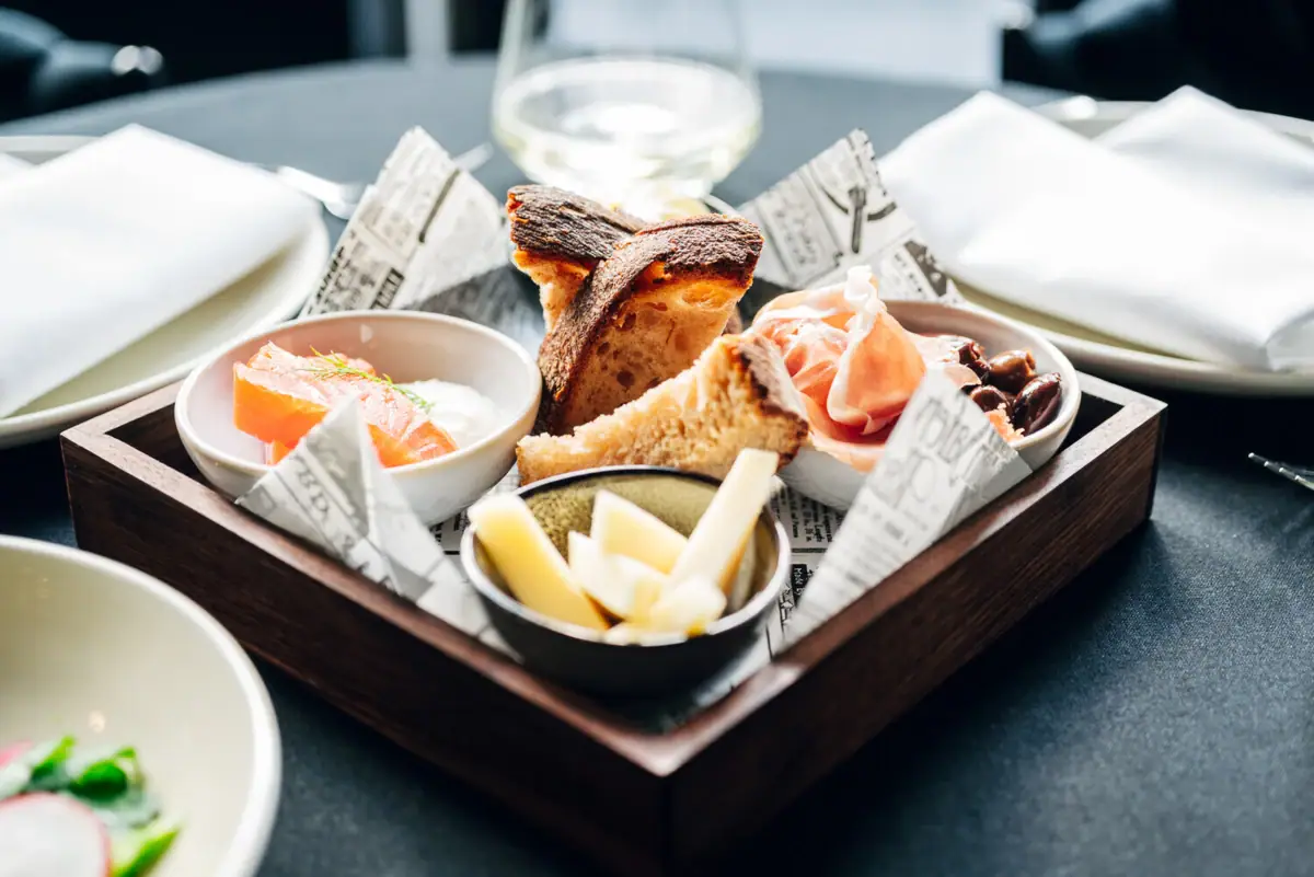 A tray of assorted seafood dishes on a table.