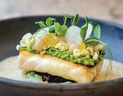A plate of food on a counter.
