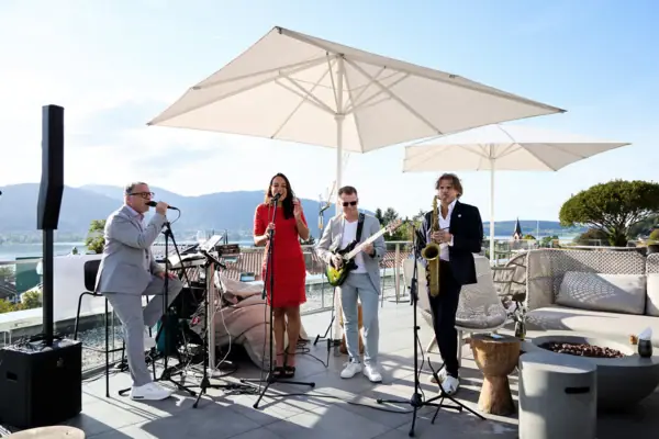 A group of people who sing and play instruments.