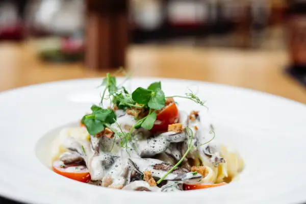 A plate of artfully arranged food on a table.