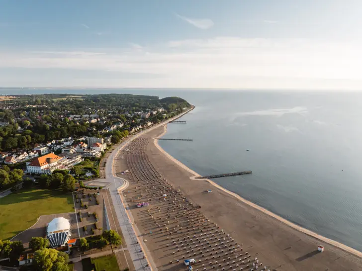 Aerial view of a small harbor area in Travemünde at sunrise. 