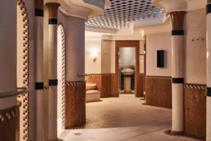 A corridor with several doors