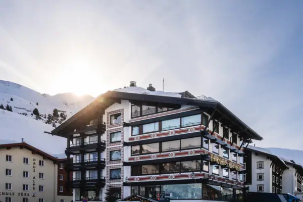A building with snow on its roof.