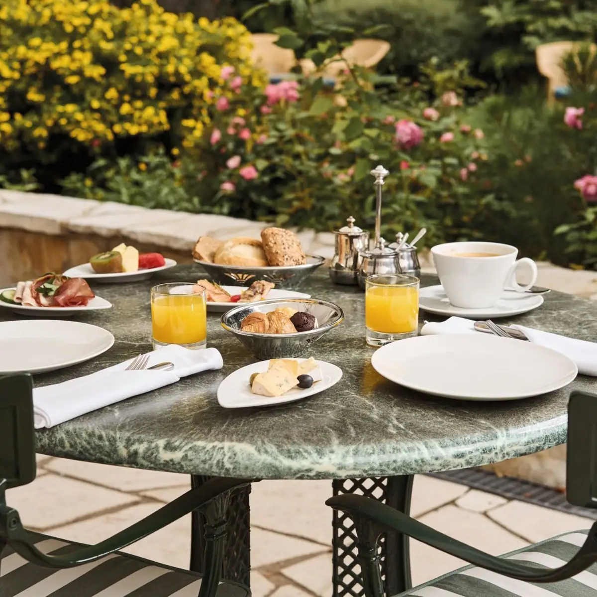 A table set with various dishes and tableware.