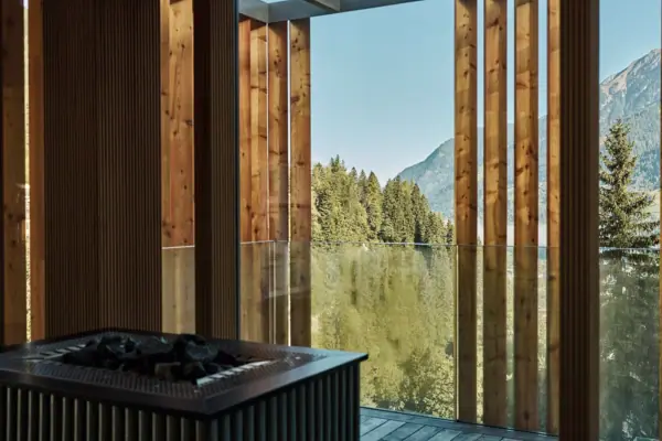 Sauna with infusion bowl and trees in the background