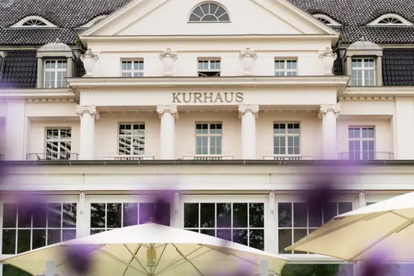 A building with a large window and a large parasol.