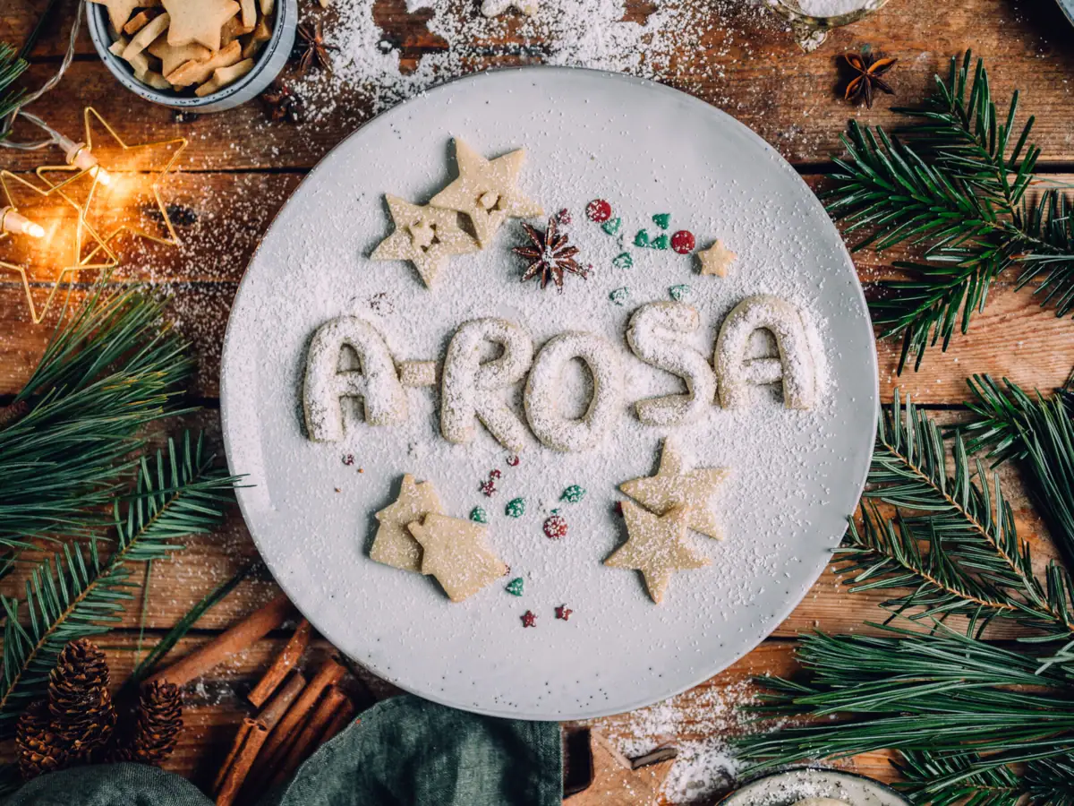 Christmas cookies A plate with cookies, surrounded by Christmas decorations.