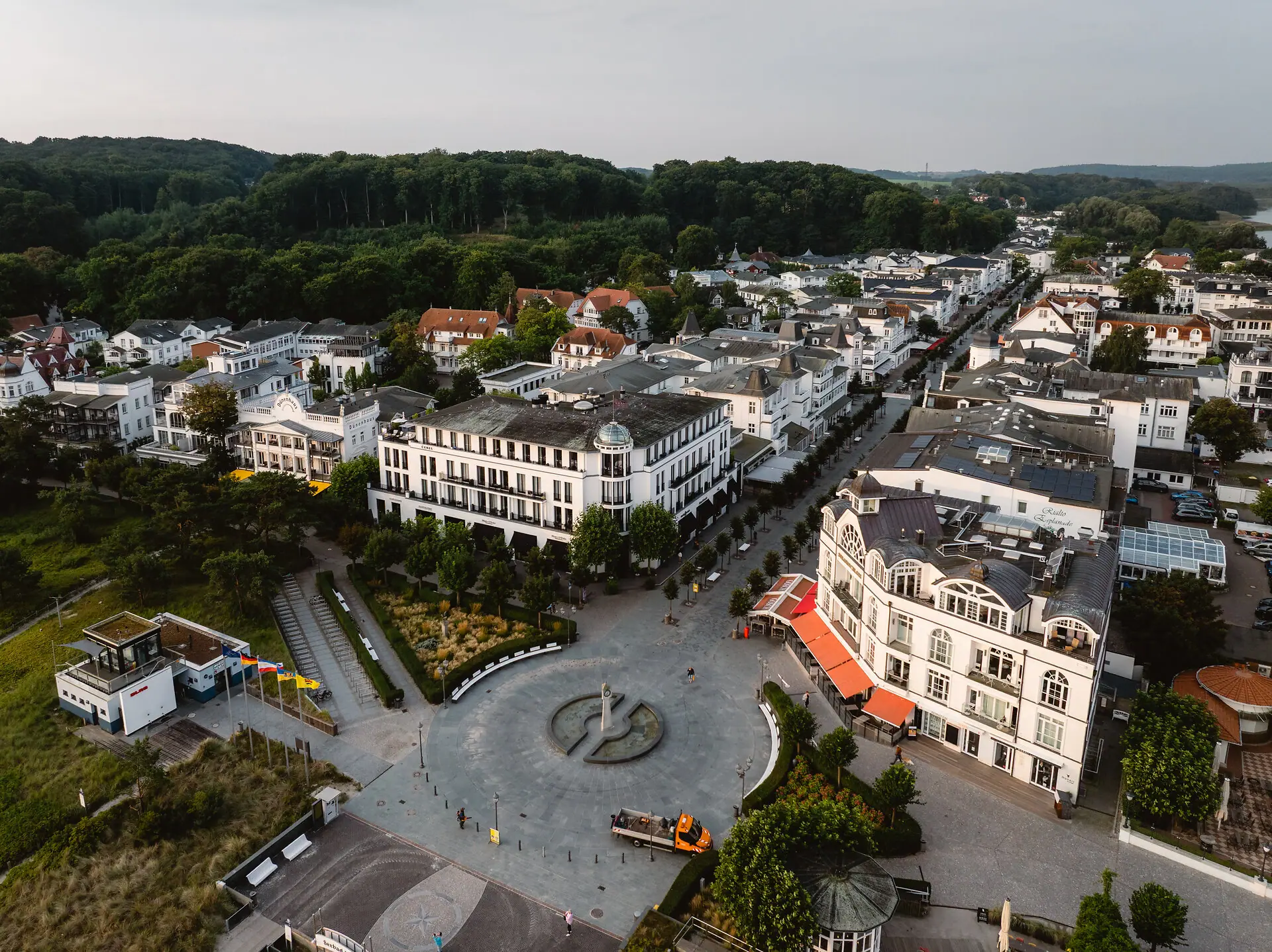 A bird’s-eye view of a city with lots of buildings and trees.