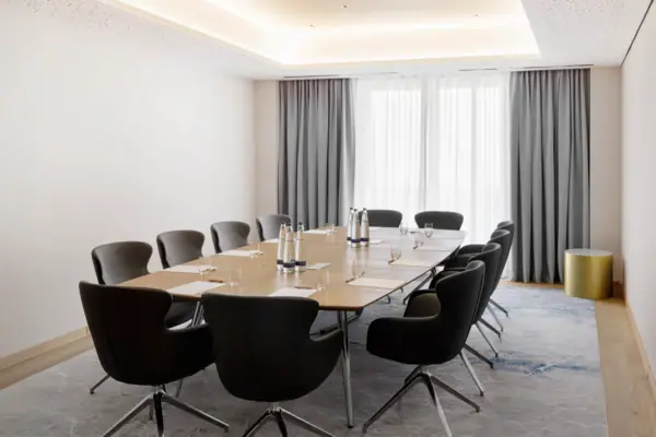 Conference Room 2 at A-ROSA Tegernsee, featuring a whiteboard 