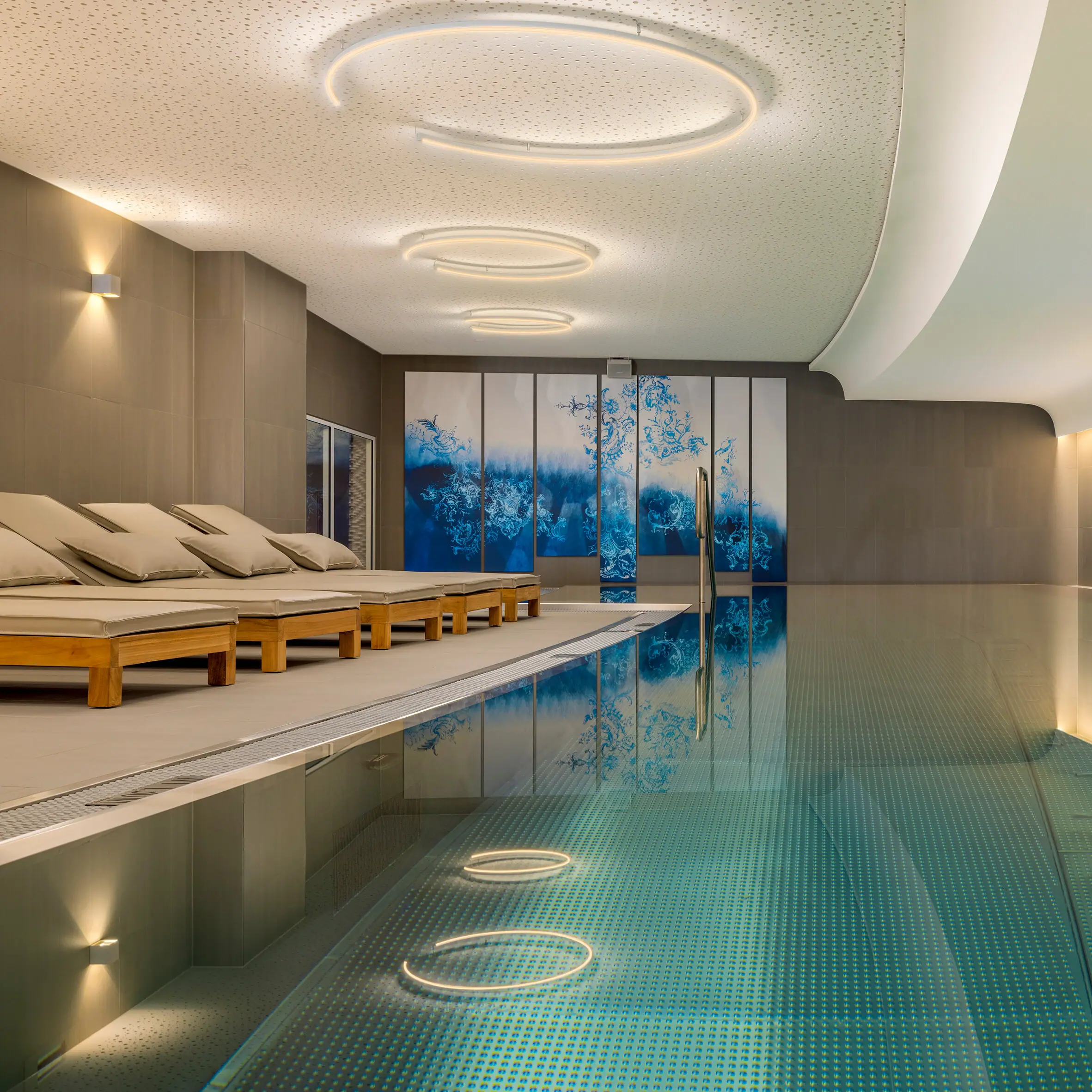 An indoor pool with a modern design.