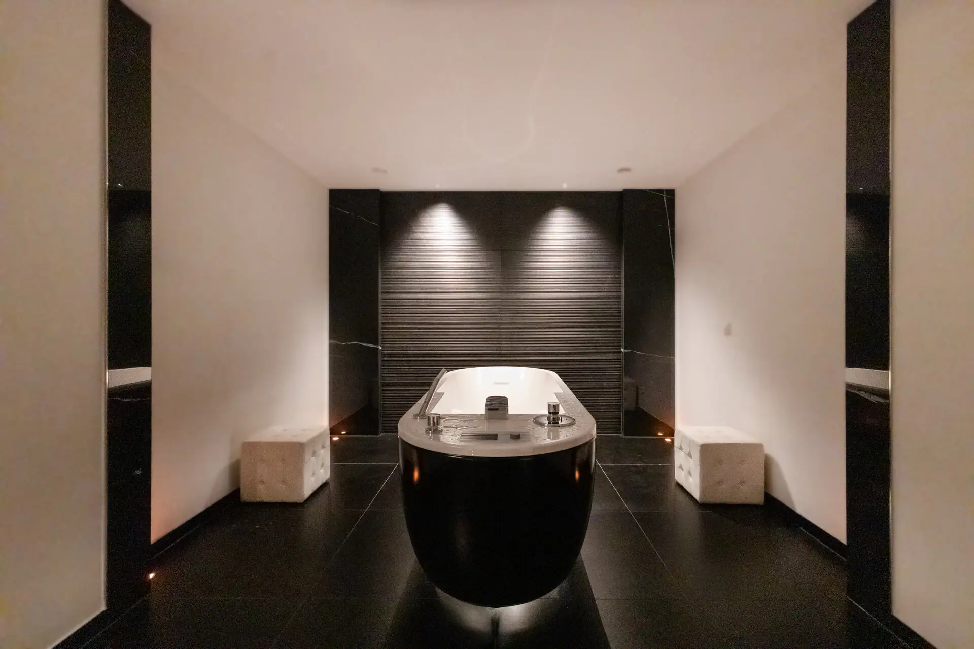 Float & Relax Offer Bathtub in a stylishly designed room with modern interior elements.