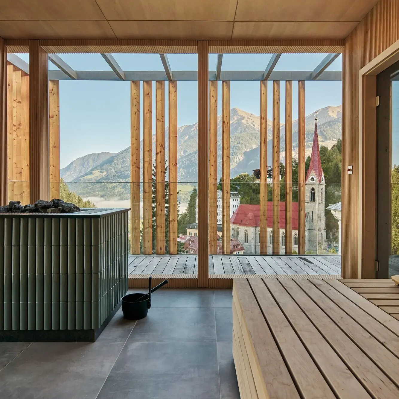 Modern sauna with panoramic views of the Gastein Valley at the Straubinger Grand Hotel spa in Salzburger Land.