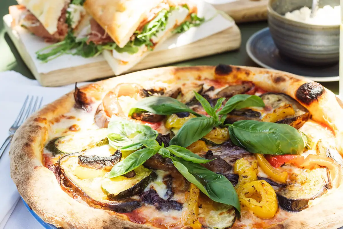 Pizza just like on Lake Garda Pizza and sandwiches on one table