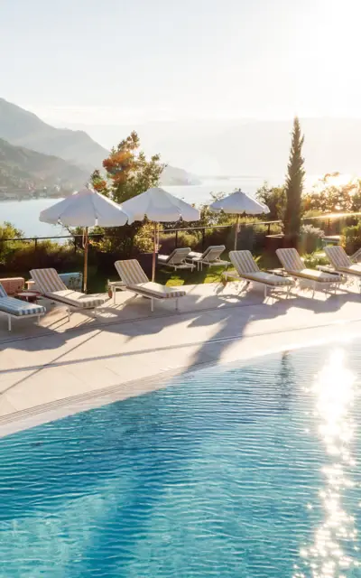 Sun lounger and parasol on a sunny day outdoors