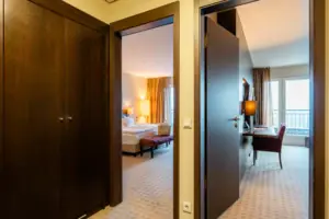 A room with two open doors.