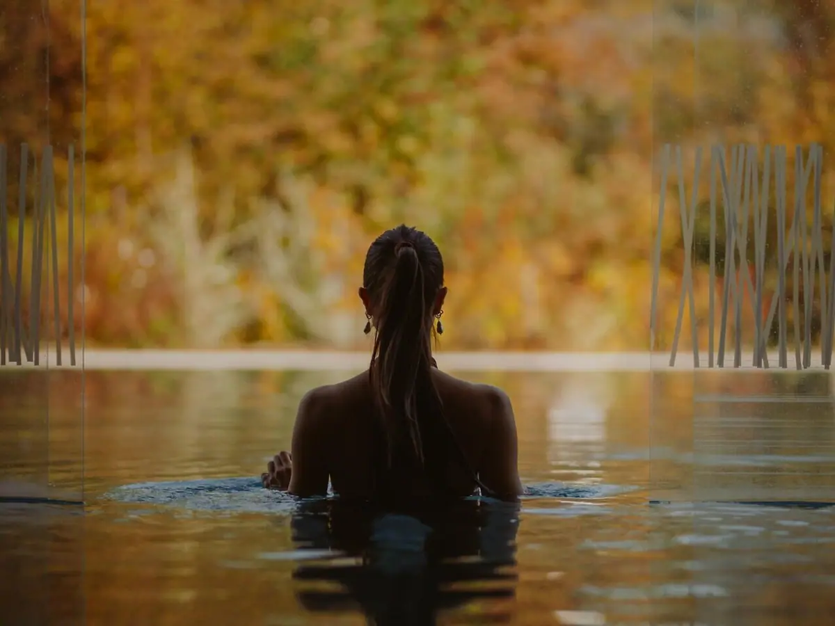 A woman in a swimming pool.
