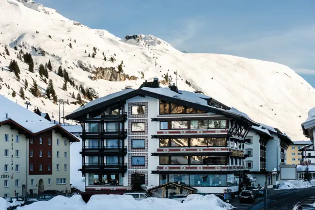 A-ROSA Zürs am Arlberg A building with snow on the side.