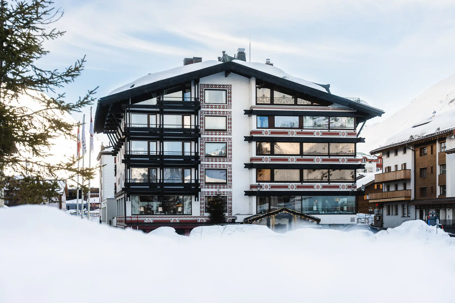 A building with snow on the ground.