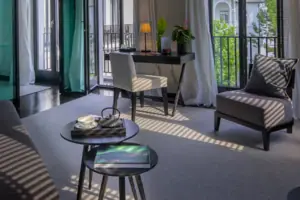 A room with a table and chairs.