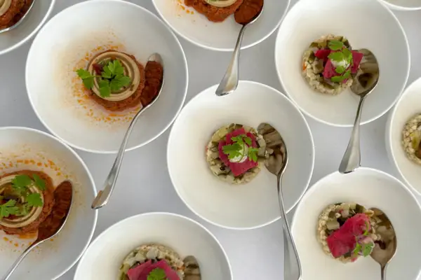 Several plates and spoons for an event at Lake Tegernsee.