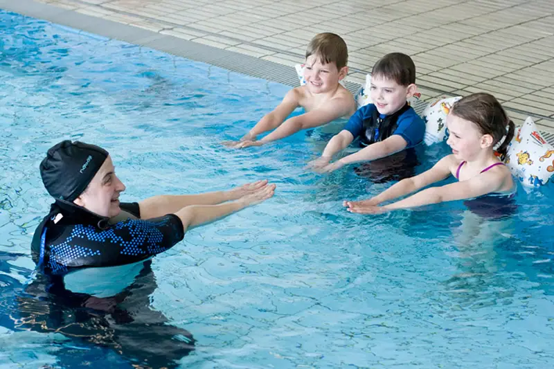 A group of children in the pool.