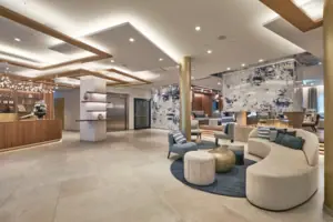 The lobby of the A-ROSA Tegernsee, featuring modern furniture.