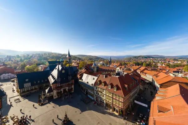Aerial view of the market square in Wenigerode with mountains in the background.