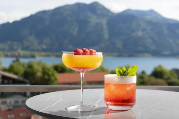 drink Two cocktails on one table.