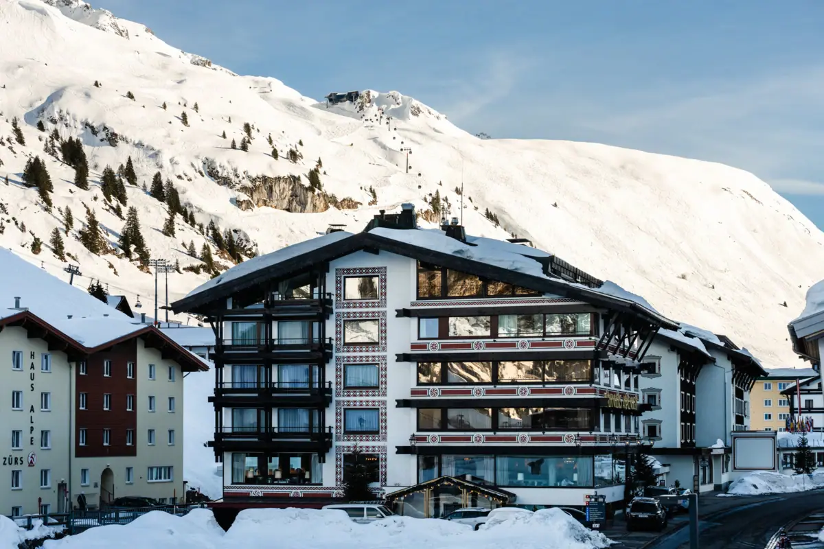 A building with snow on the side.